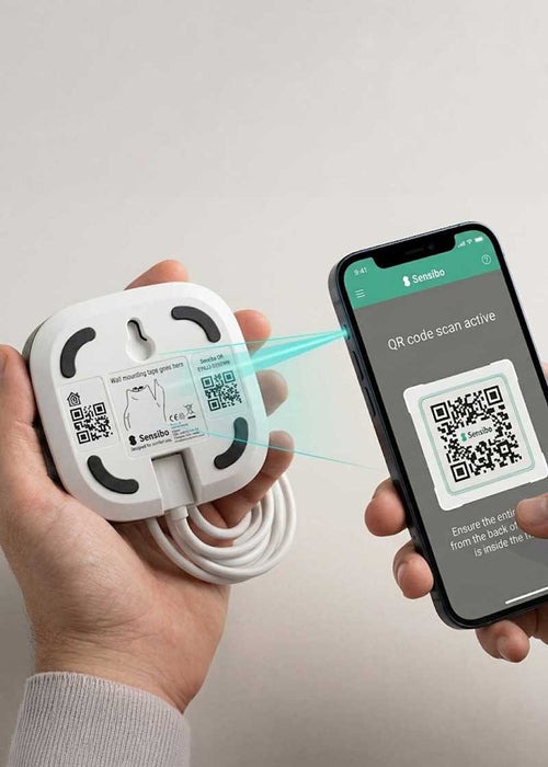 Scanning the QR code on a Sensibo device with a phone